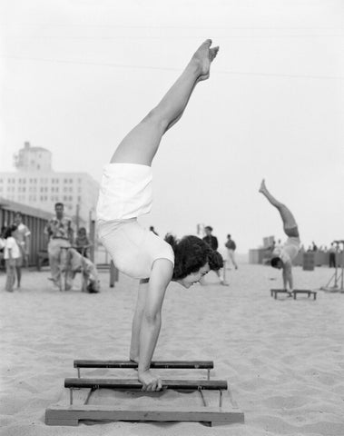 [Woman balancing on parallettes], Santa Monica