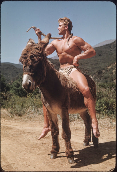 Ed Holovchik aka Ed Fury (with snake on mule), Southern California