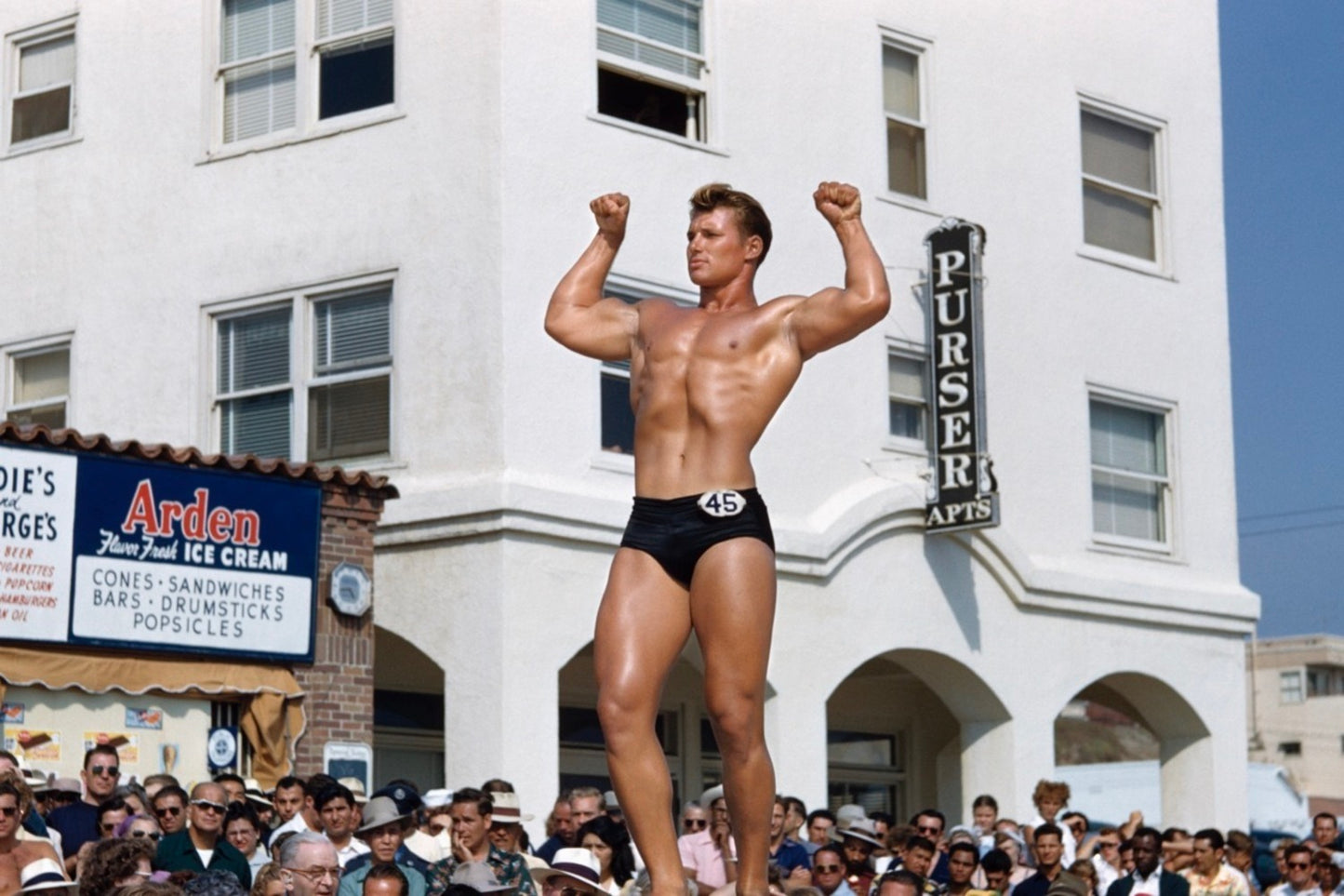 [bodybuilder onstage flexing], Santa Monica Beach