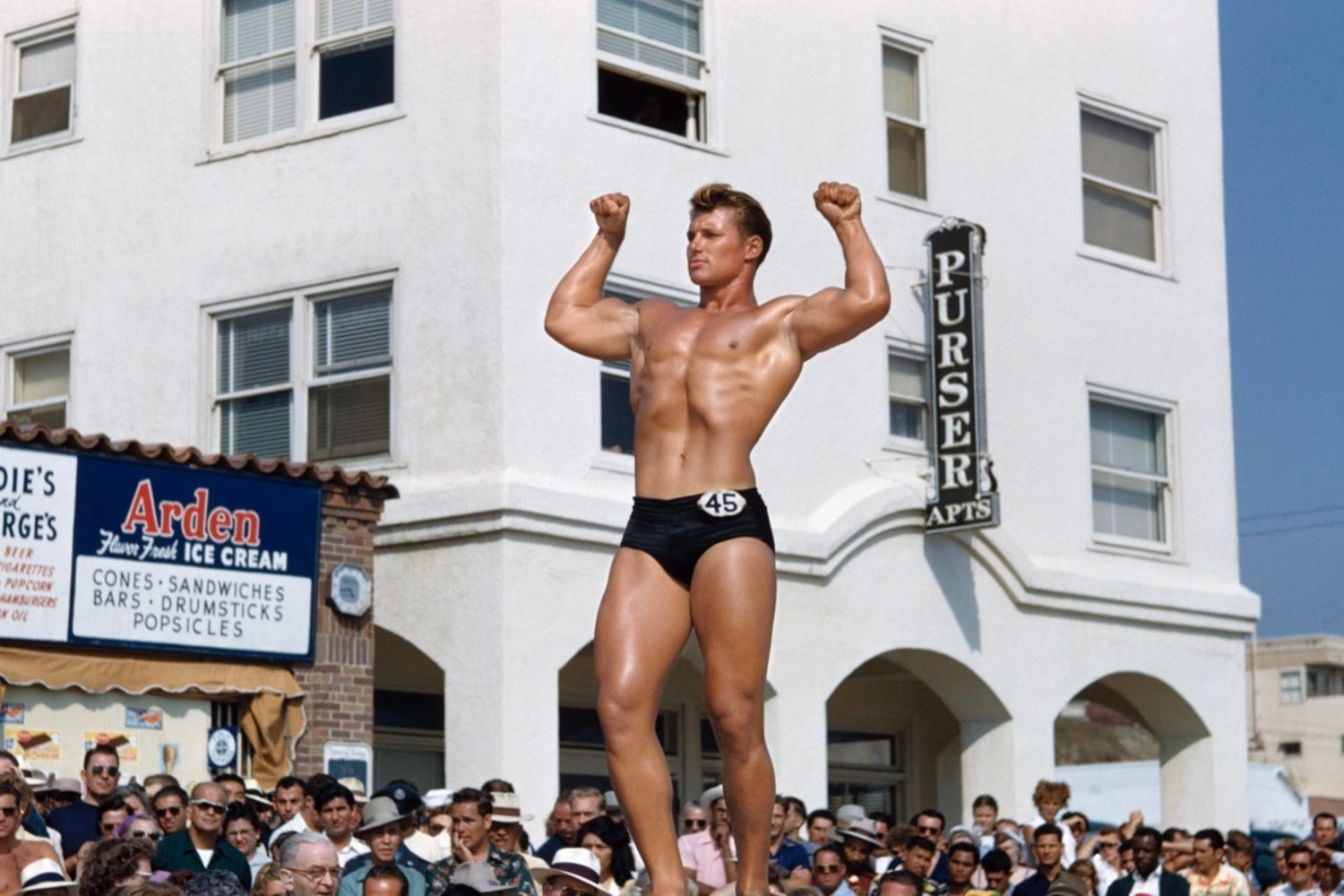 [bodybuilder onstage flexing], Santa Monica Beach