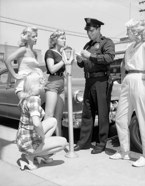 [Four women being ticketed for indecent exposure], Los Angeles